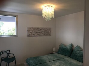 2 quartos, berço de viagem, Wi-Fi de cortesia, roupa de cama