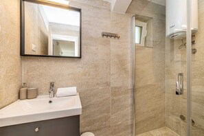 Hair dryer, towels, toilet paper