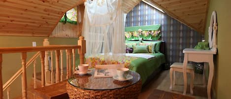Duplex, Jetted Tub (17 PY Bubble Spa Room) | 1 bedroom, individually decorated, individually furnished