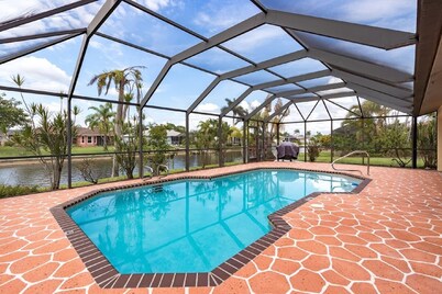CAPE CORAL FLORIDA WATERFRONT WITH   HEATED POOL, PRIVATE DOCK 