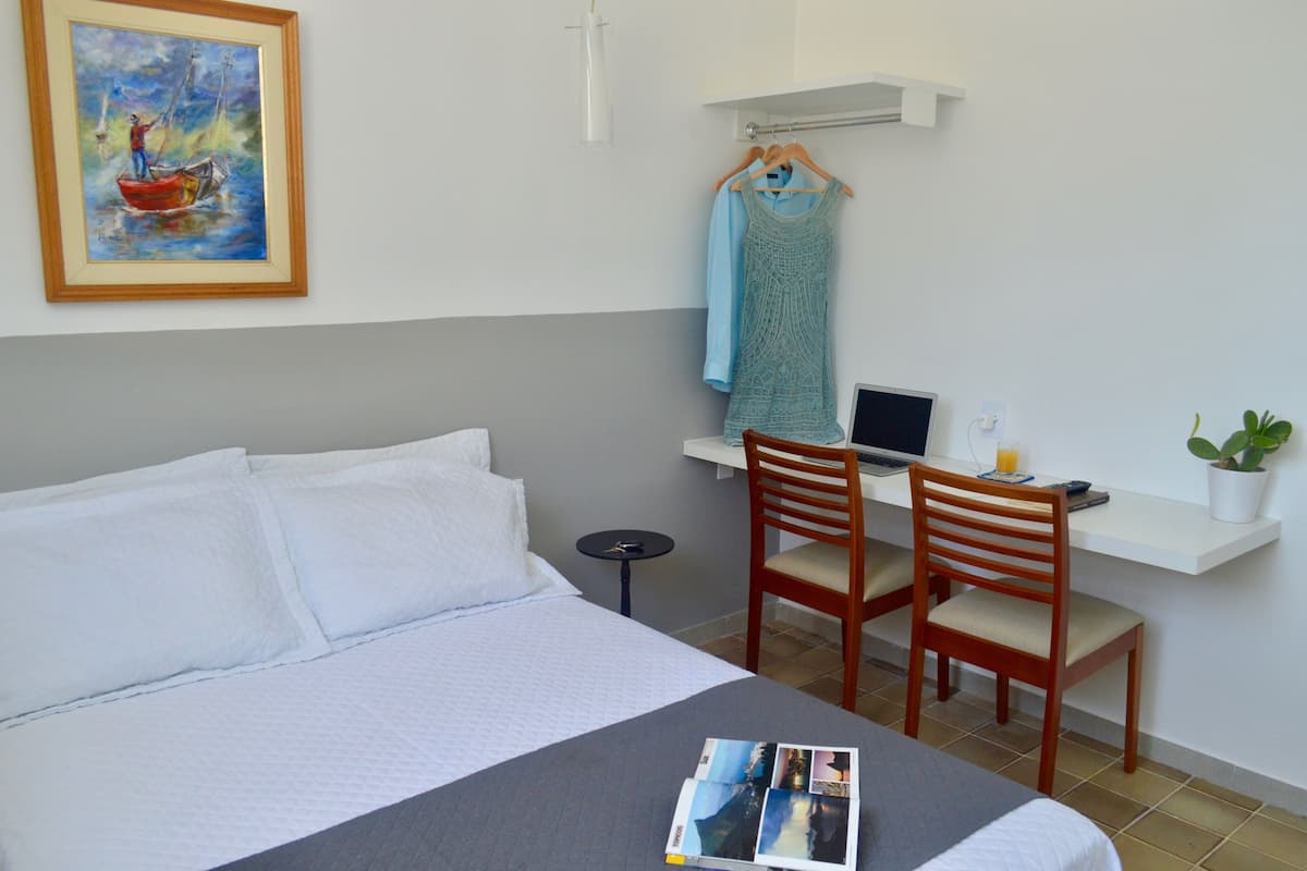 Deluxe Double Room, 1 Double Bed | Minibar, individually decorated, individually furnished, desk