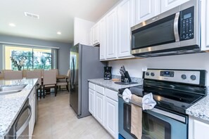 House, Multiple Beds | Private kitchen