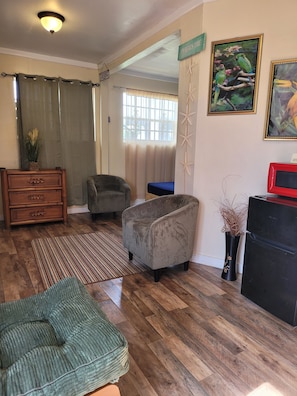 Comfort Studio Suite, 1 Bedroom | Living area | Flat-screen TV - Cocoplum Rest N Hideaway 1 (Nassau)