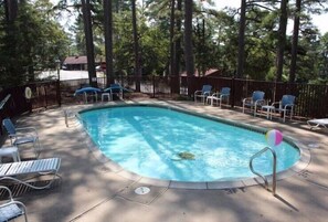 Seasonal outdoor pool, open 10:00 AM to 10:00 PM, sun loungers