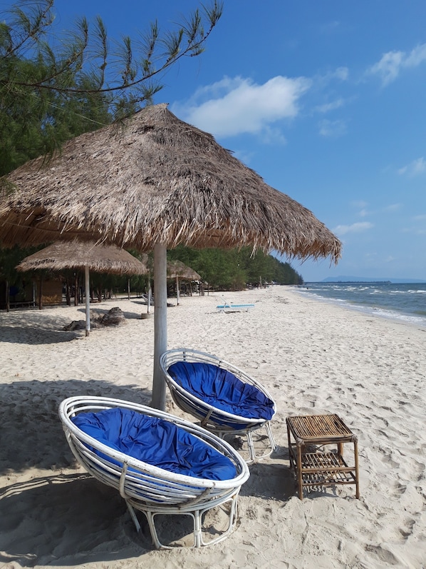 Private beach, white sand, sun-loungers, beach umbrellas