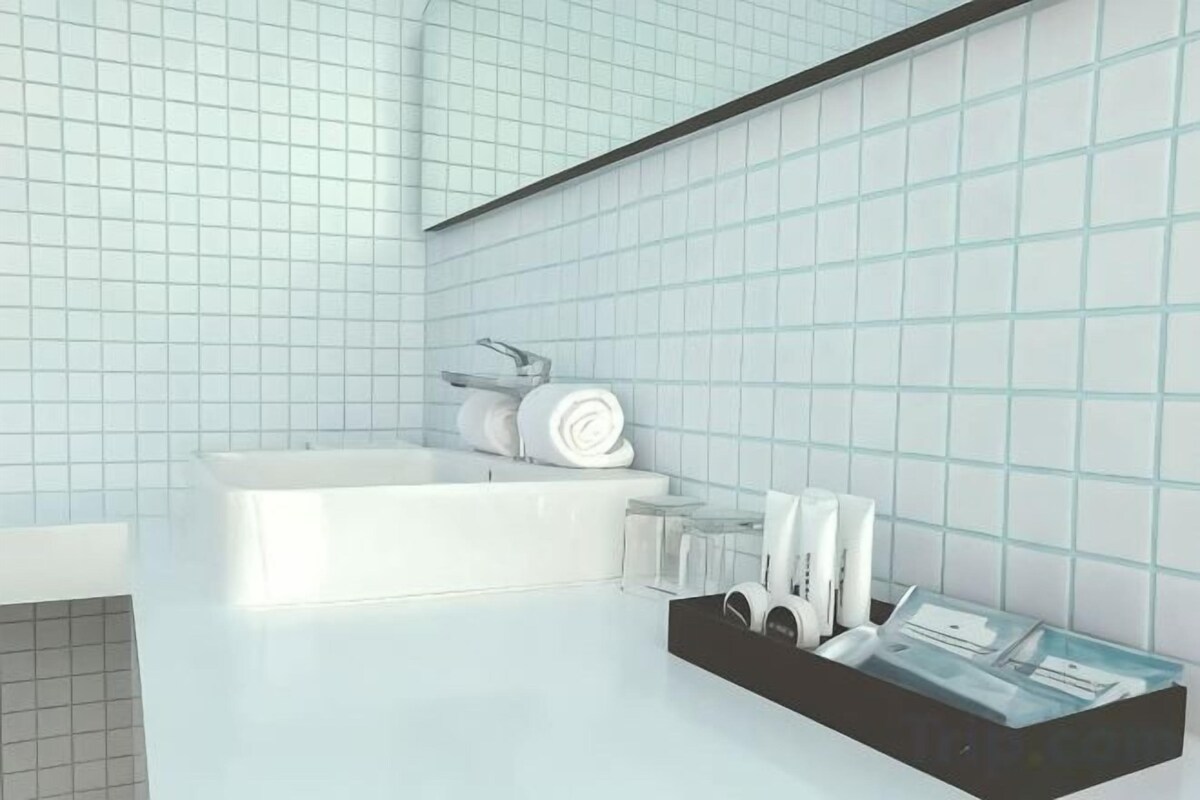 Shower, free toiletries, slippers, towels