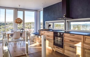 Fridge, stovetop, dishwasher, coffee/tea maker