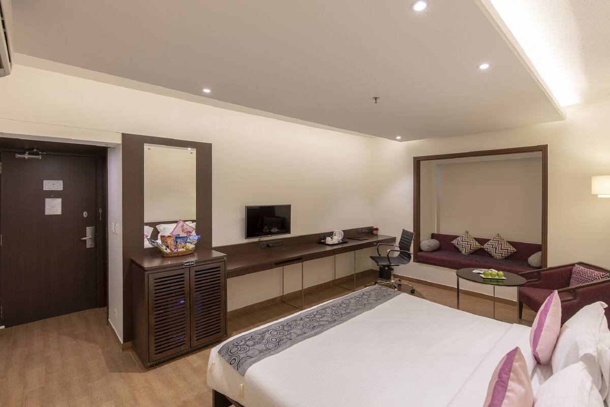 Executive Double or Twin Room | Living area | Fireplace