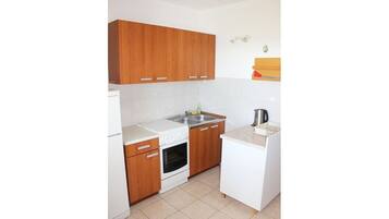 Fridge, oven, electric kettle, cookware/dishes/utensils