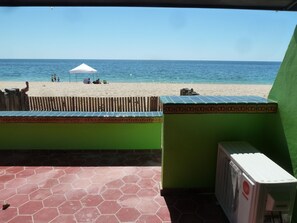 On the beach, sun loungers