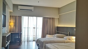 Executive Quadruple Room | Blackout drapes, soundproofing, iron/ironing board, WiFi (free) - Sunway Resort Suite by Wonderpoly (Petaling Jaya)