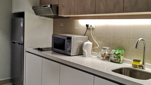Exclusive Studio Suite | Private kitchenette | Coffee/tea maker, full-size fridge, microwave, electric kettle - Sunway Resort Suite by Wonderpoly (Petaling Jaya)