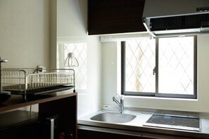 Fridge, microwave, cookware/dishes/utensils