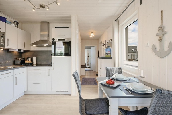 Fridge, stovetop, dishwasher, coffee/tea maker