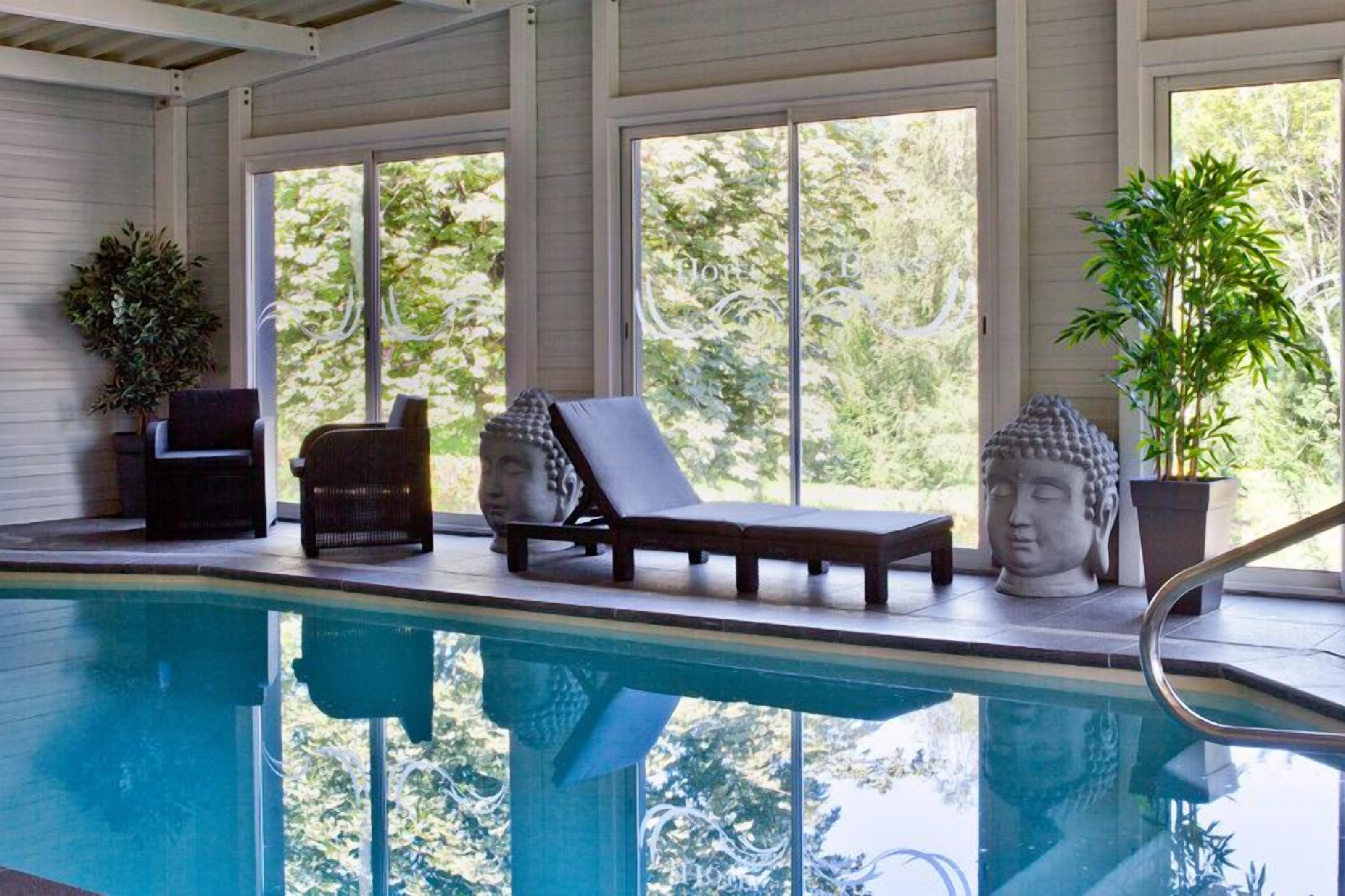 indoor pool, seasonal outdoor pool, pool umbrellas, pool loungers