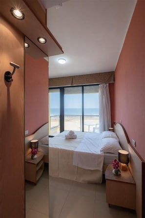 Double Room, Balcony, Sea View | Cribs/infant beds, free WiFi, bed sheets