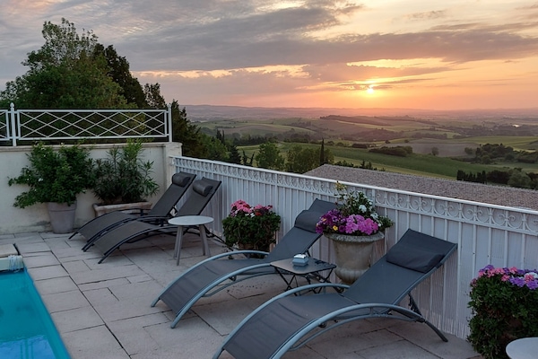 Outdoor pool, pool umbrellas, sun loungers