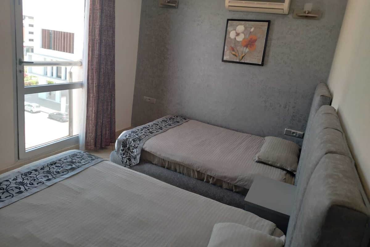 Economy Apartment, 3 Bedrooms | 2 bedrooms, premium bedding, minibar, free WiFi