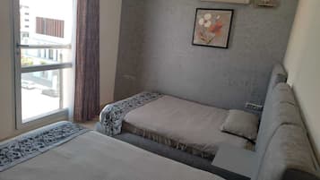 Apartamento económico, 3 habitaciones | Ropa de cama de alta calidad, minibar, wifi gratis y ropa de cama