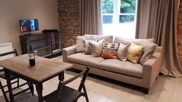 Duplex Apartment | Living area | 20-inch LCD TV with digital channels, TV