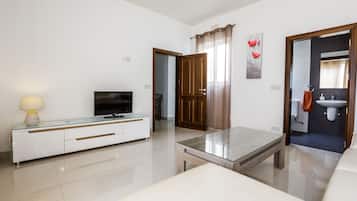 Penthouse Deluxe, 1 chambre, vue colline | Coin séjour
