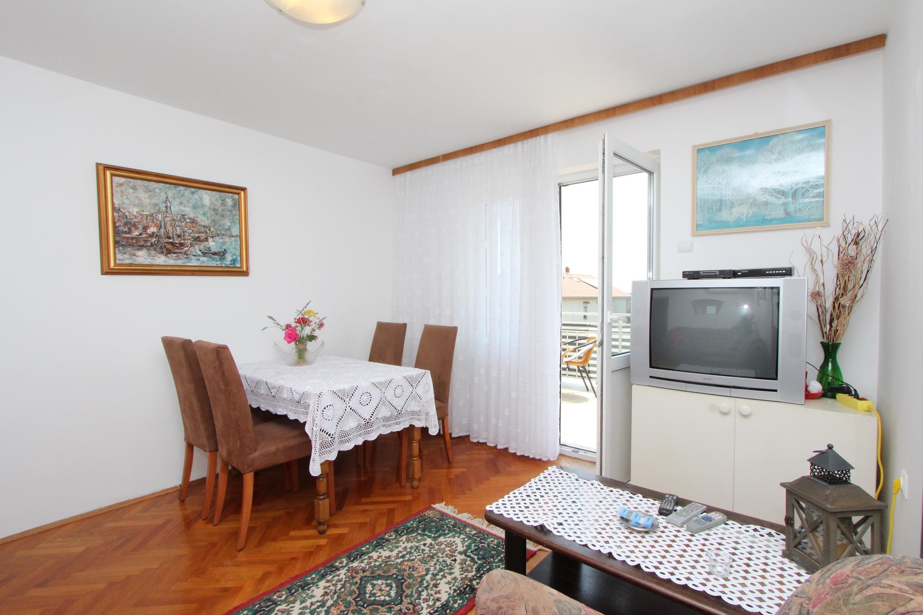 Apartment, 2 Bedrooms, Balcony, Sea View | Living area | Flat-screen TV