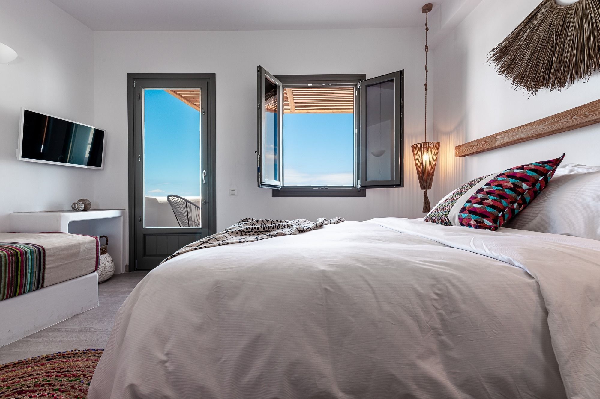 Suite, sjøutsikt | Sengetøy av topp kvalitet, minibar og safe på rommet