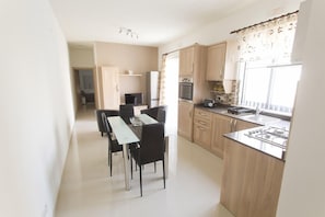 Comfort Apartment, 2 Bedrooms, Beach View | Private kitchen | Full-size fridge, microwave, oven, stovetop - Waterside Apartments (Zebbug)