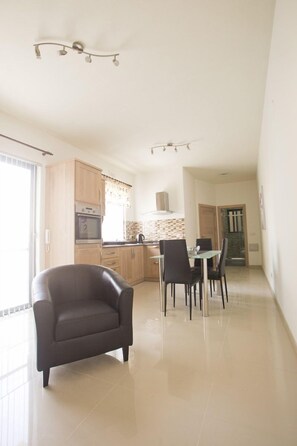 Comfort Apartment, 2 Bedrooms, Beach View | Private kitchen | Full-sized fridge, microwave, oven, stovetop
