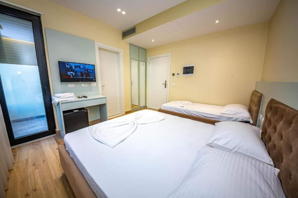 Dreibettzimmer, Balkon