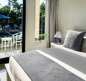 奢华双人房, 泳池景观 | 客房内保险箱、办公桌、遮光窗帘、免费 WiFi