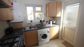 Family Bungalow, Multiple Beds | Private kitchen | Full-size fridge, microwave, oven, stovetop