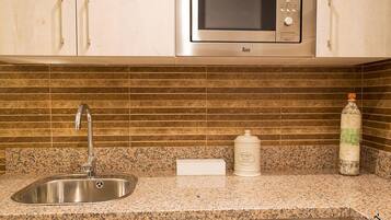 Fridge, microwave, coffee/tea maker, toaster