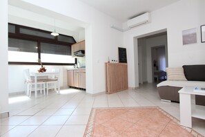 Apartment, 2 Bedrooms, Balcony | Living area | 45-inch flat-screen TV with satellite channels, TV