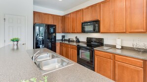 Townhome, 3 Bedrooms | Private kitchen | Coffee/tea maker, fridge, microwave, oven