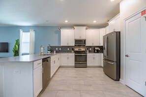 House, Multiple Beds | Private kitchen