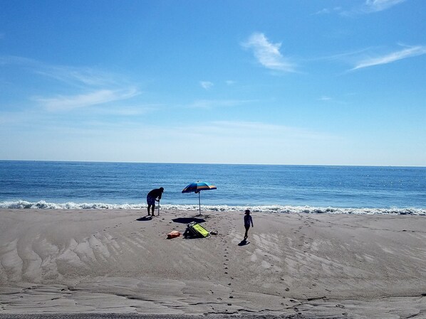 On the beach, sun loungers