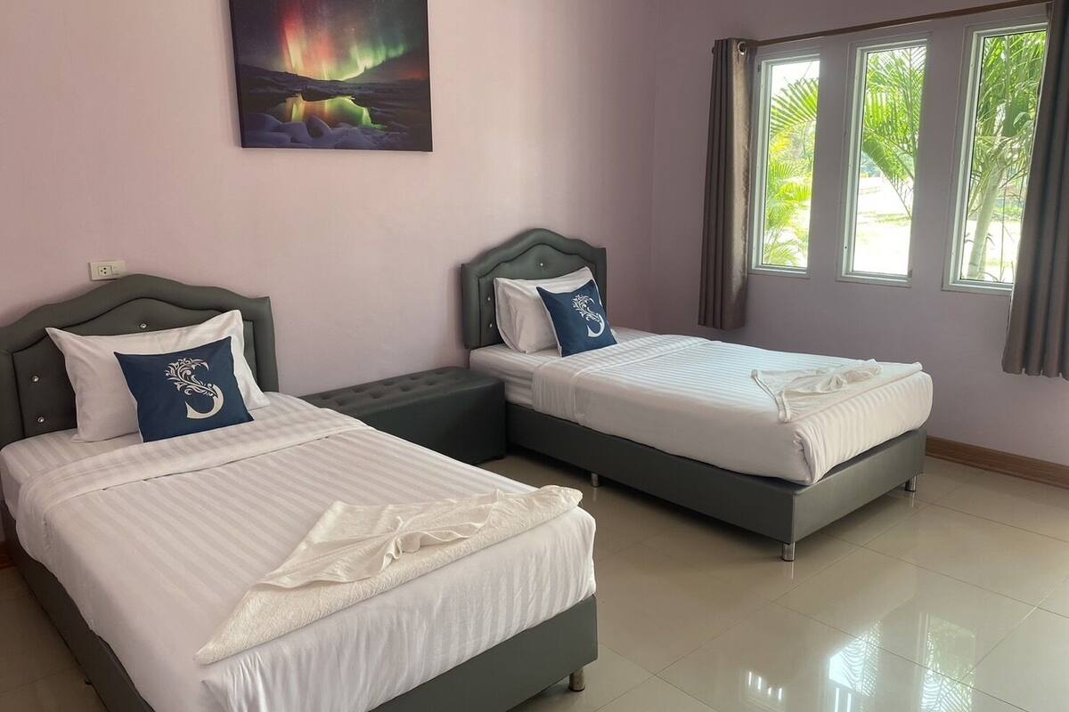 Habitación estándar con 2 camas individuales | Cortinas blackout y wifi gratis