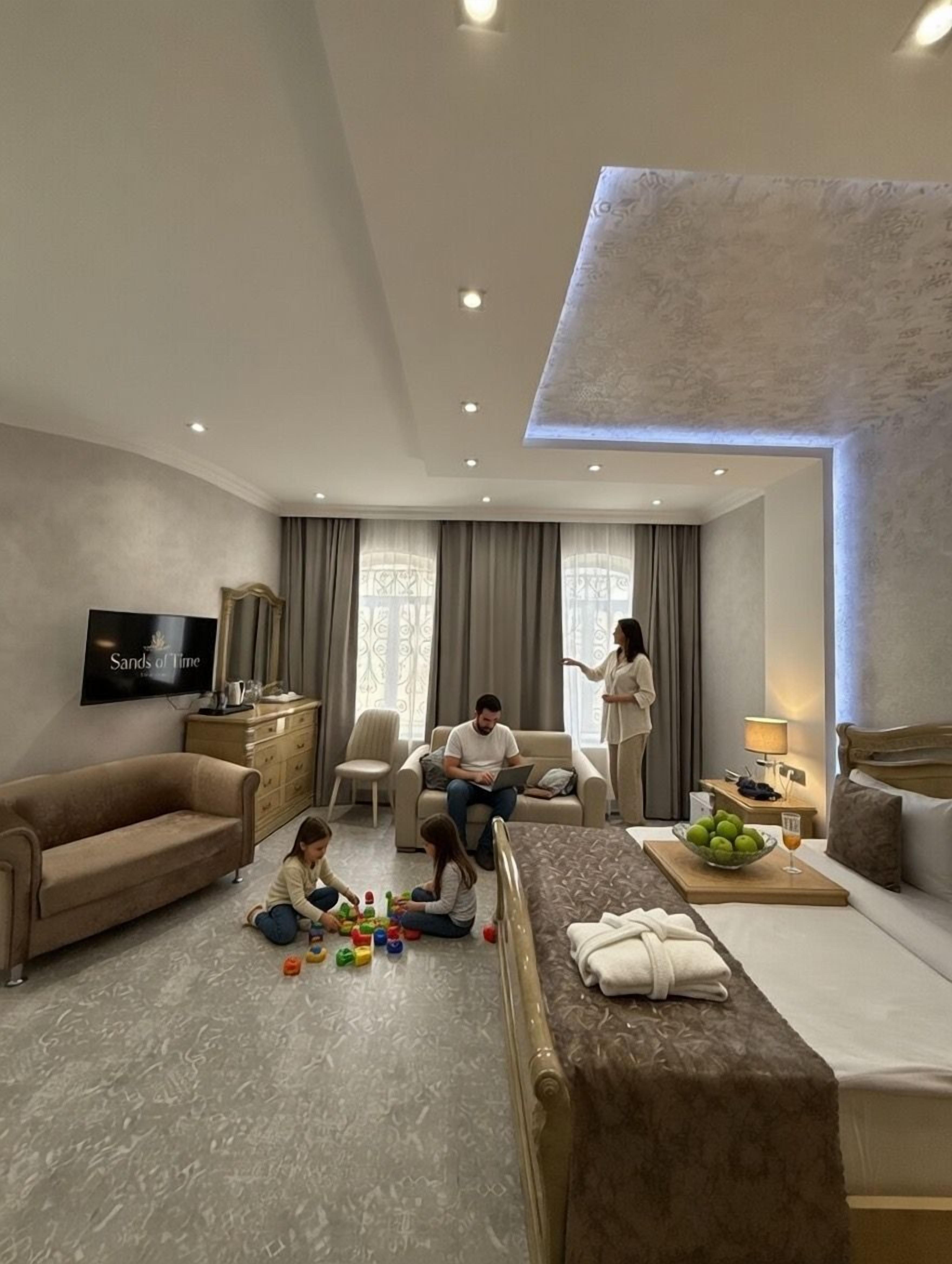 Deluxe Quadruple Room | Premium bedding, pillowtop beds, in-room safe, individually decorated