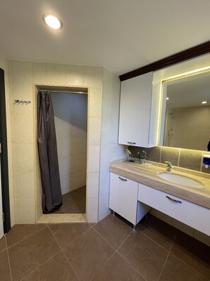 Shower, jetted tub, hair dryer, slippers