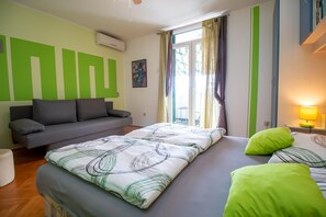 Apartamento, 2 quartos | 2 quartos, ferros/tábuas de passar roupa, Wi-Fi de cortesia