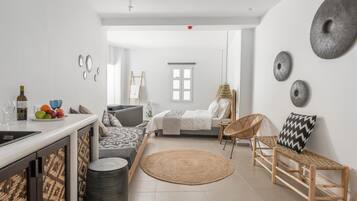 Executive Suite, Hot Tub, Sea View | Living room | Plasma TV