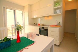 Appartement, vue mer | Cuisine privée