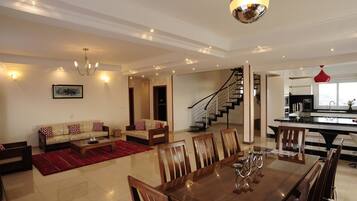 Deluxe Apartment | Living area | 56-inch plasma TV with satellite channels, TV
