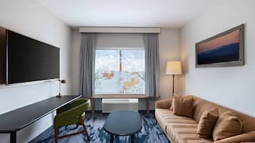 40-inch flat-screen TV with cable channels, TV