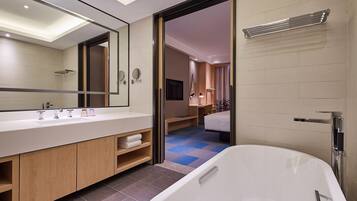 Suite, 1 Bedroom | Bathroom | Free toiletries, hair dryer, slippers, towels