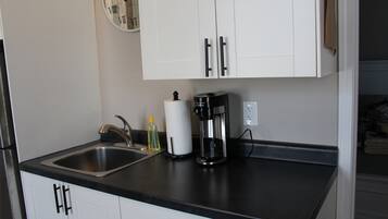 Fridge, microwave, coffee/tea maker, toaster