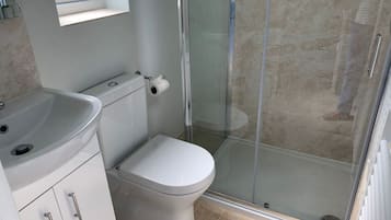 Eco-friendly toiletries, hair dryer, towels