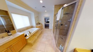 Bathtub, jetted tub, hair dryer, towels