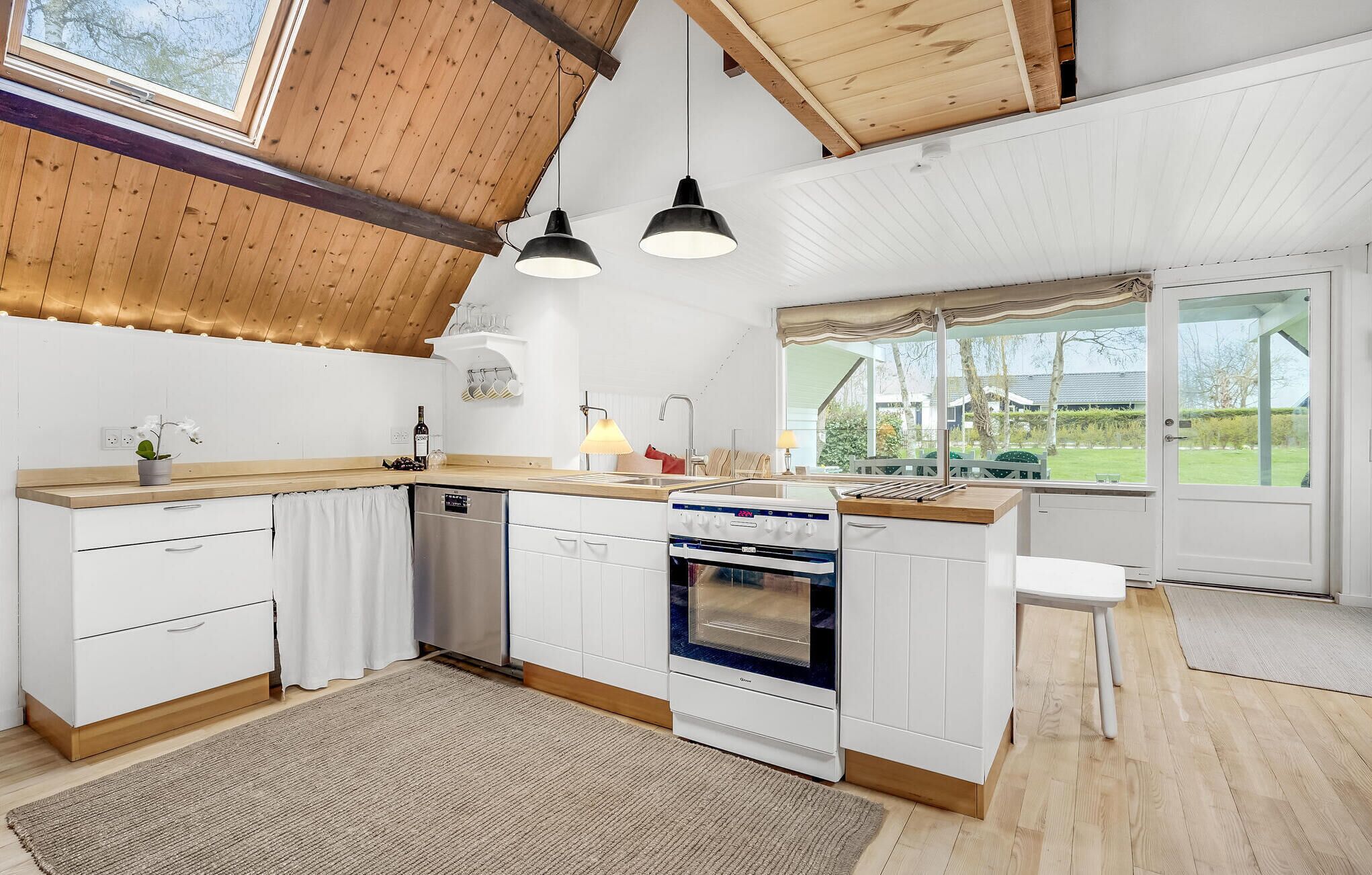 Fridge, stovetop, dishwasher, coffee/tea maker